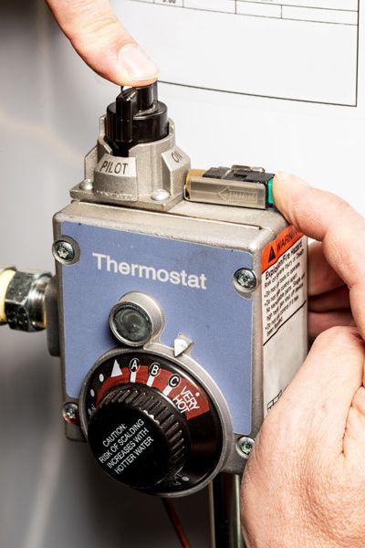 A pilot light is tinkered with. Why Does My Water Heater’s Pilot Light Keep Going Out?